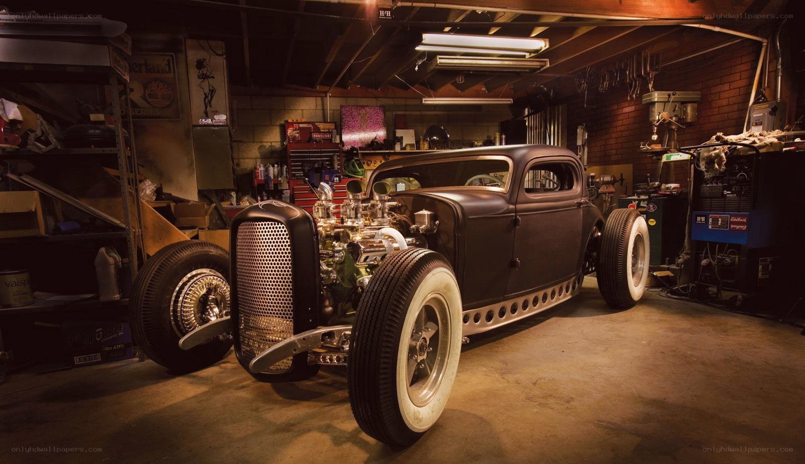 Custom hot rod in a garage