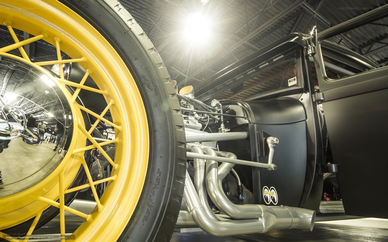 Custom hot rod with yellow wheels
