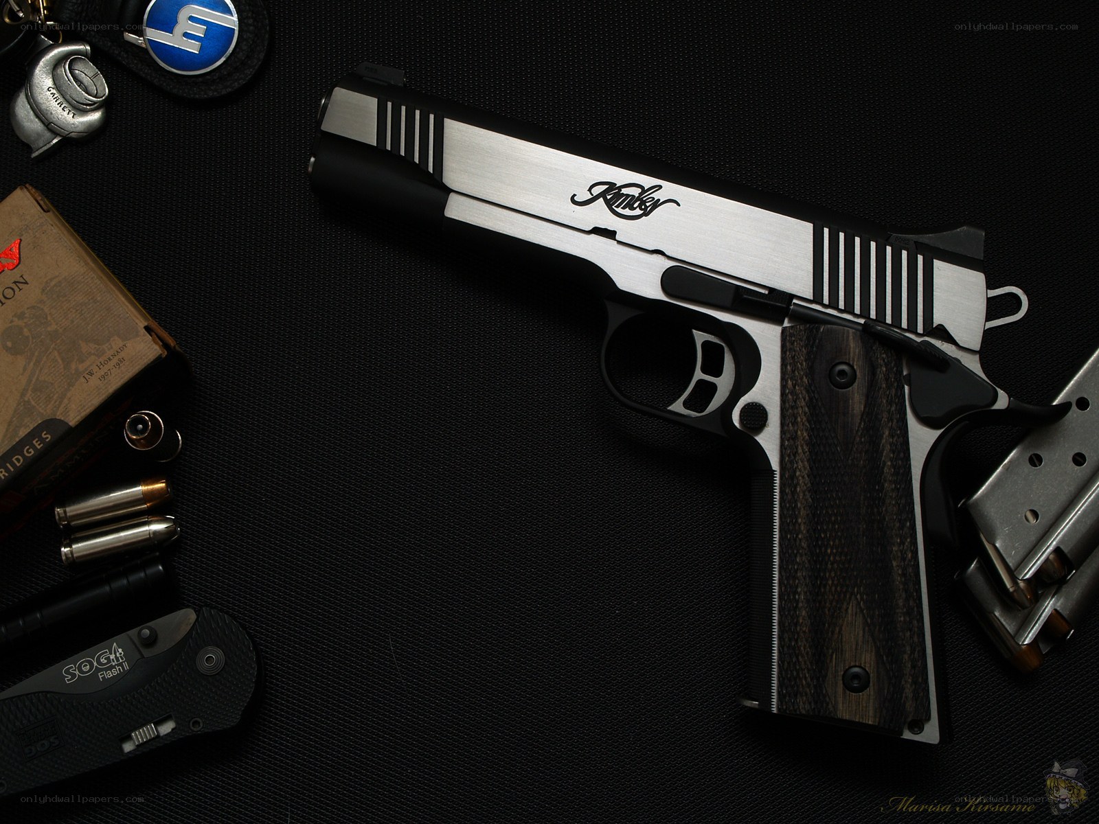 Custom Kimber pistol with accessories