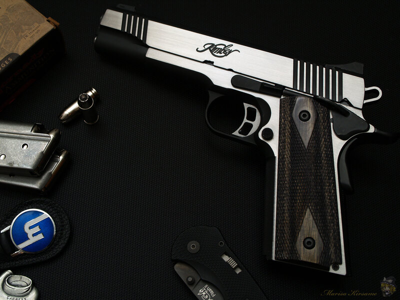 Custom Kimber pistol with accessories