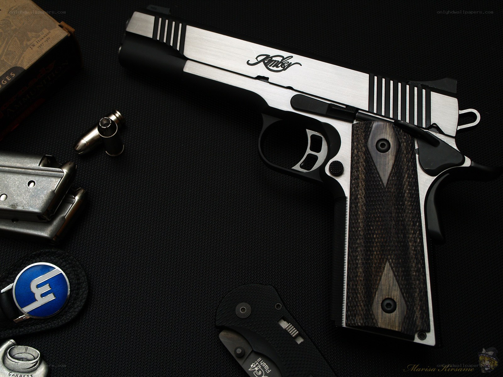 Custom Kimber pistol with accessories