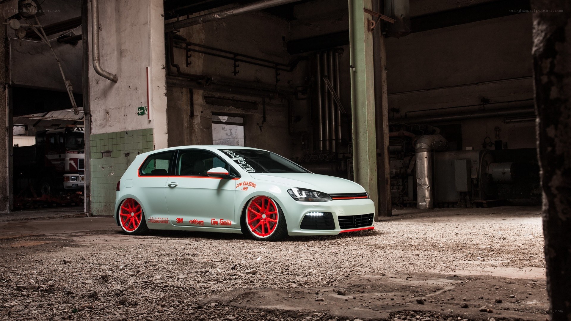 custom light green car in warehouse