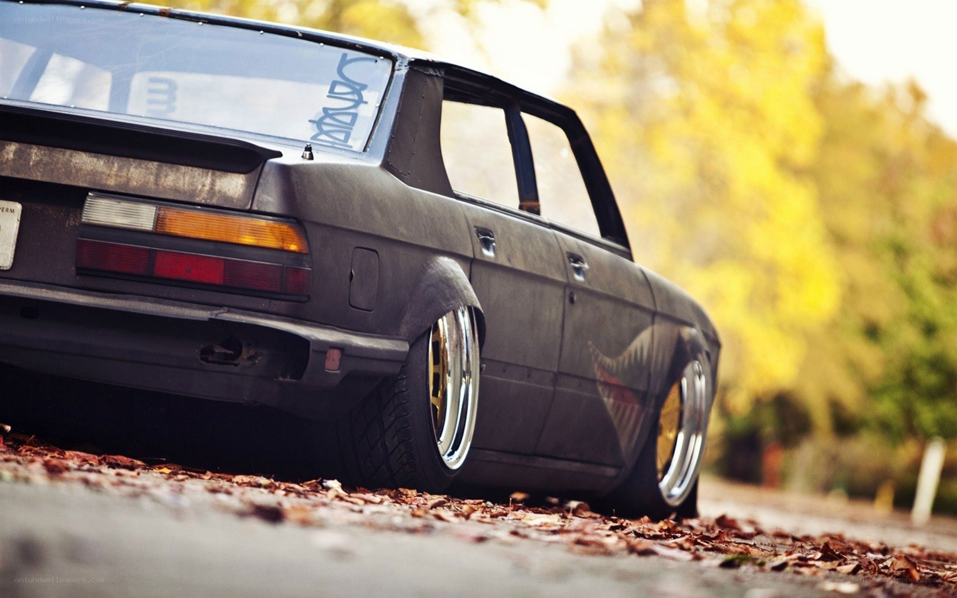 custom lowered car in autumn