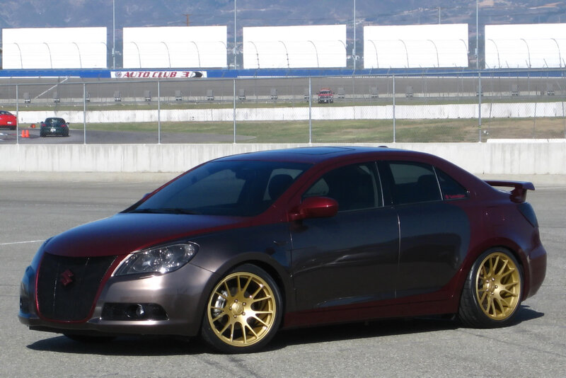 custom maroon and gold sedan