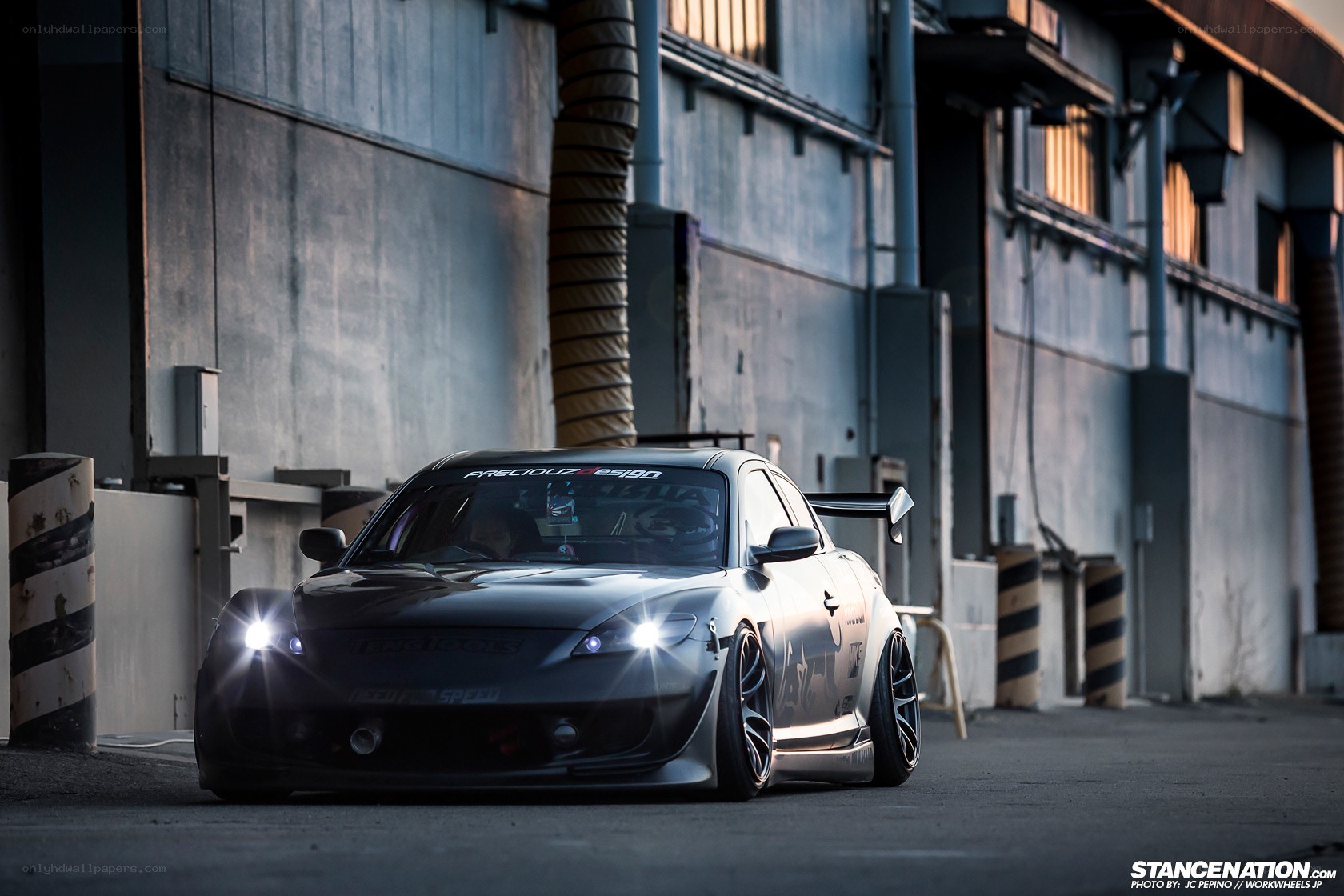 Custom Mazda RX-8 in industrial setting
