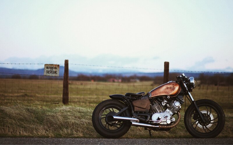 Custom Motorcycle in Field — Brown, Serene, Sunset