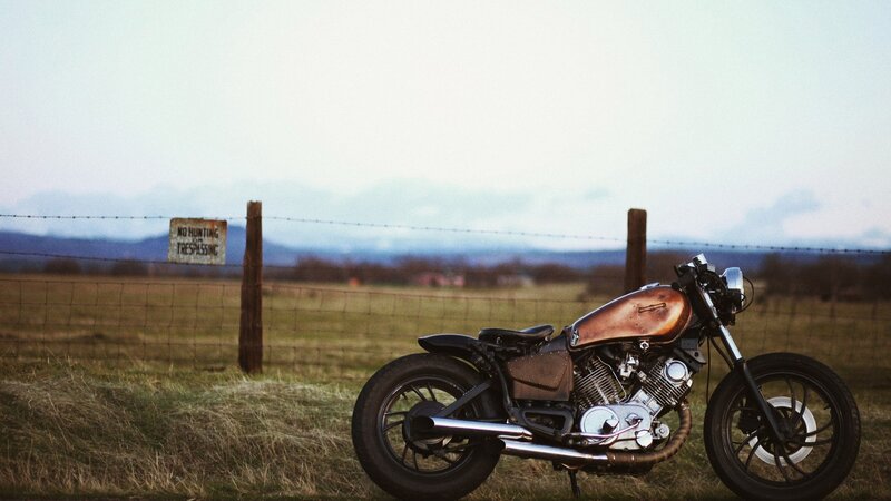 Custom Motorcycle in Field — Brown