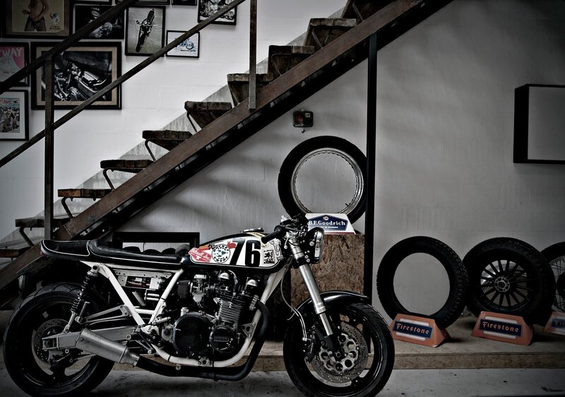 Custom motorcycle under stairs
