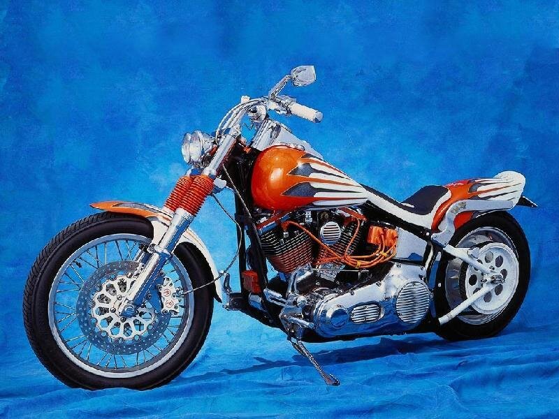 custom orange and white chopper motorcycle