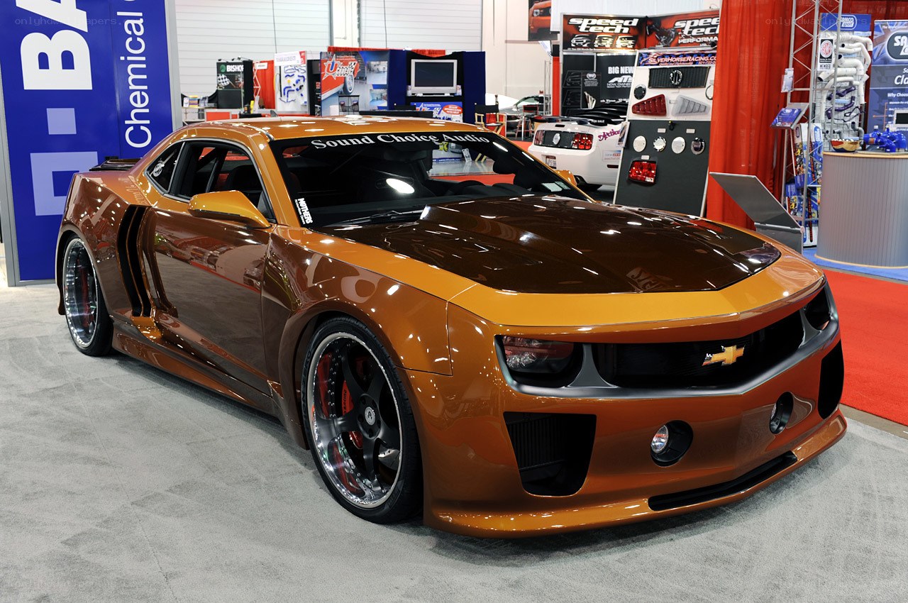 Custom orange Camaro at auto show