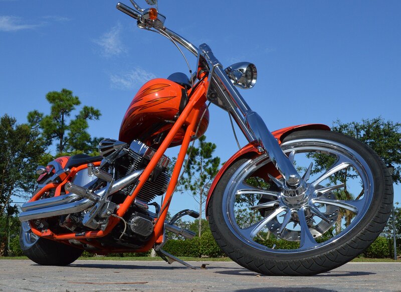 Custom Orange Chopper Motorcycle — Bright