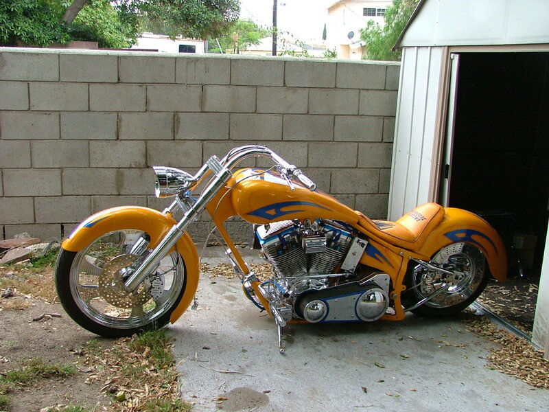 Custom Orange Chopper Motorcycle — Calm, Afternoon
