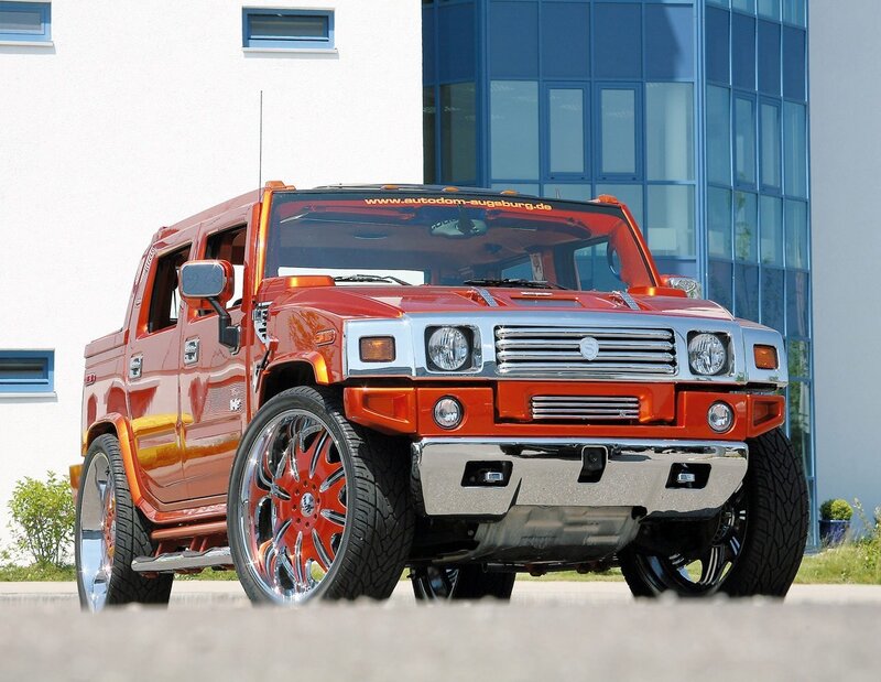 Custom orange Hummer H2 pickup