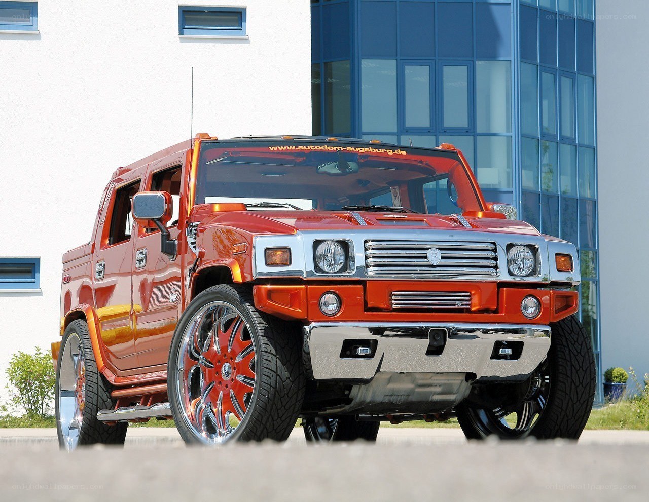 Custom orange Hummer H2 pickup