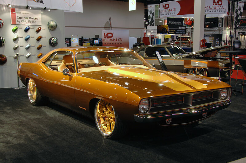 Custom orange muscle car on display