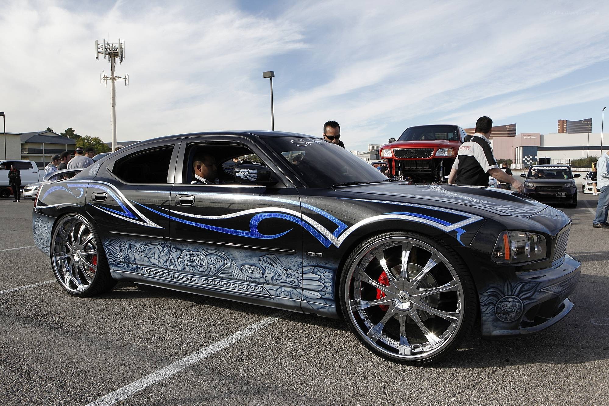 Custom-painted black car at a show