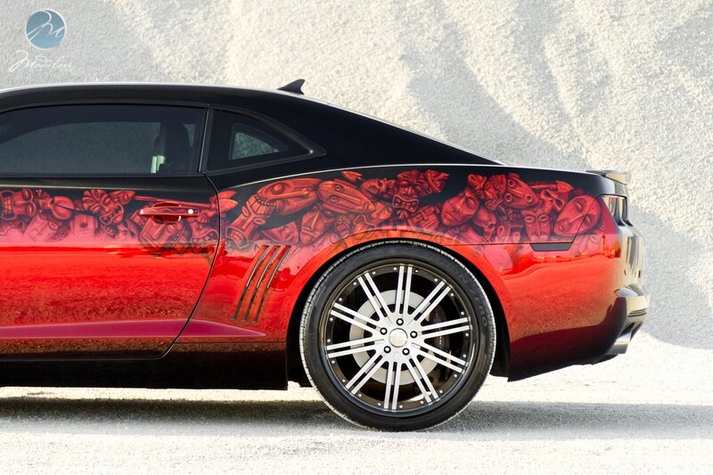 custom painted car with tribal art