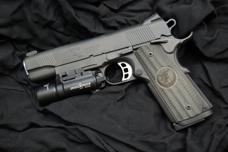 custom pistol with flashlight