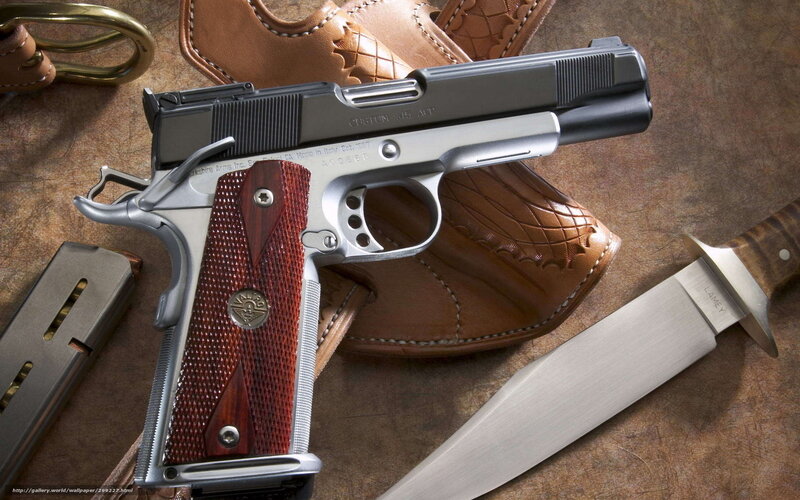Custom pistol with knife and holster