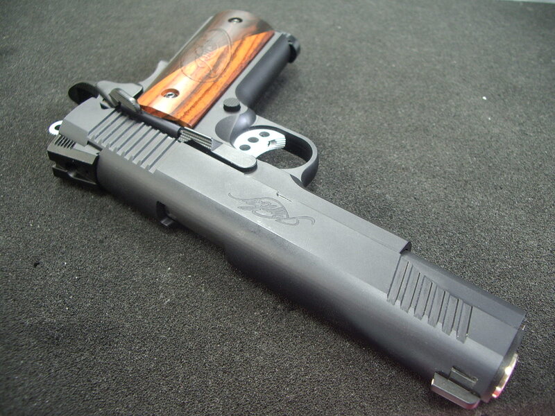 custom pistol with wooden grips