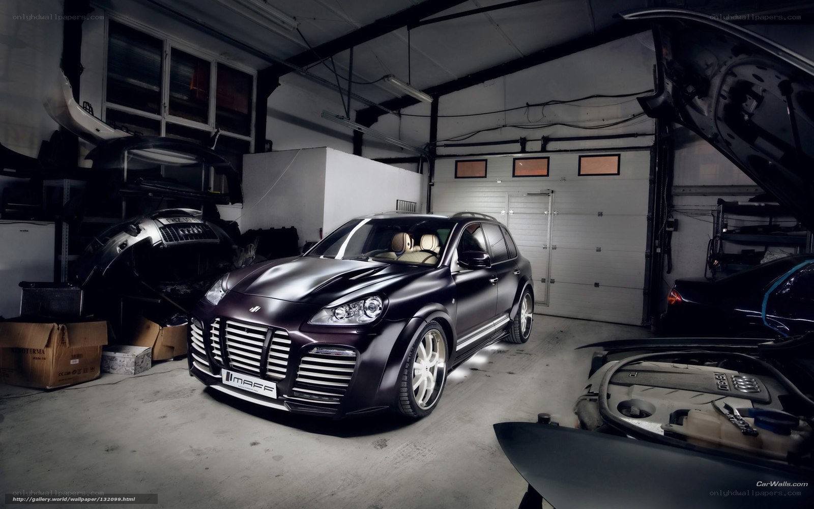 Custom Porsche Cayenne in garage