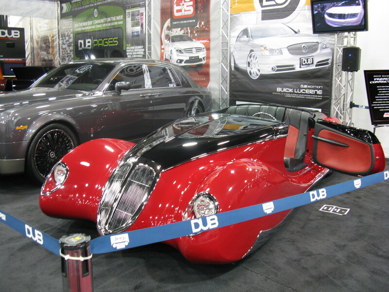 Custom red and black car on display