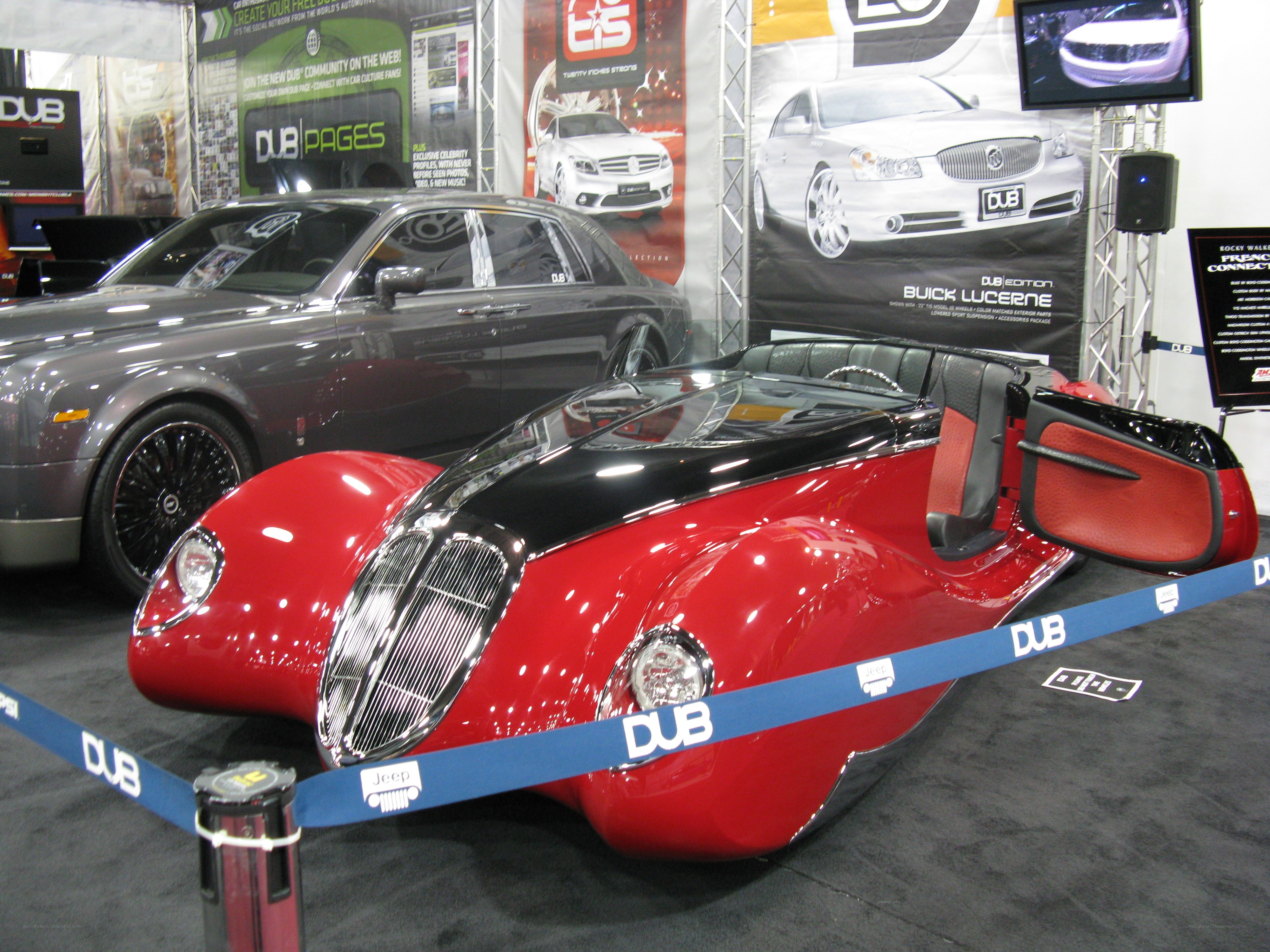 Custom red and black car on display