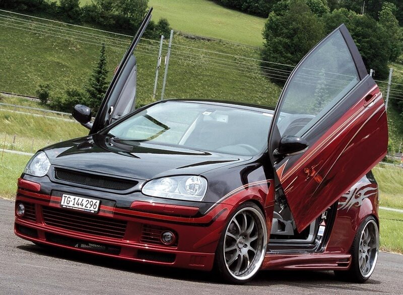 Custom red and black car with gullwing doors