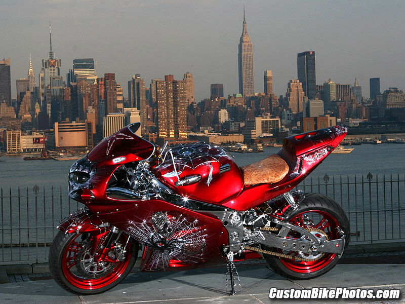 custom red motorcycle in city