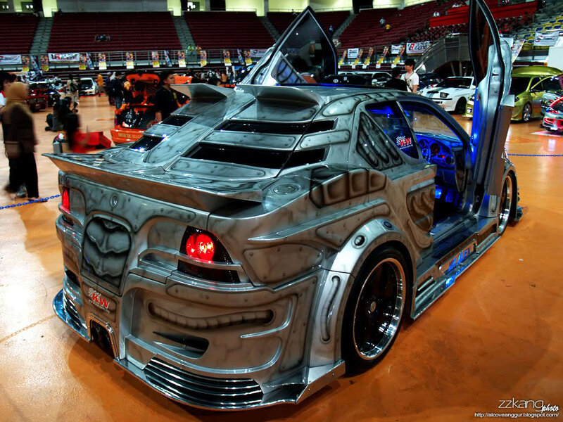 Custom silver car with gullwing doors