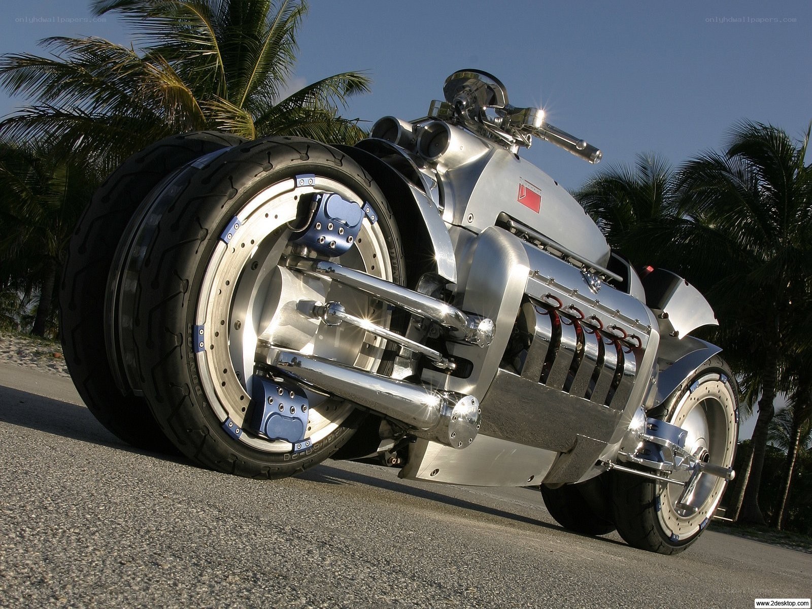 Custom silver motorcycle on beach