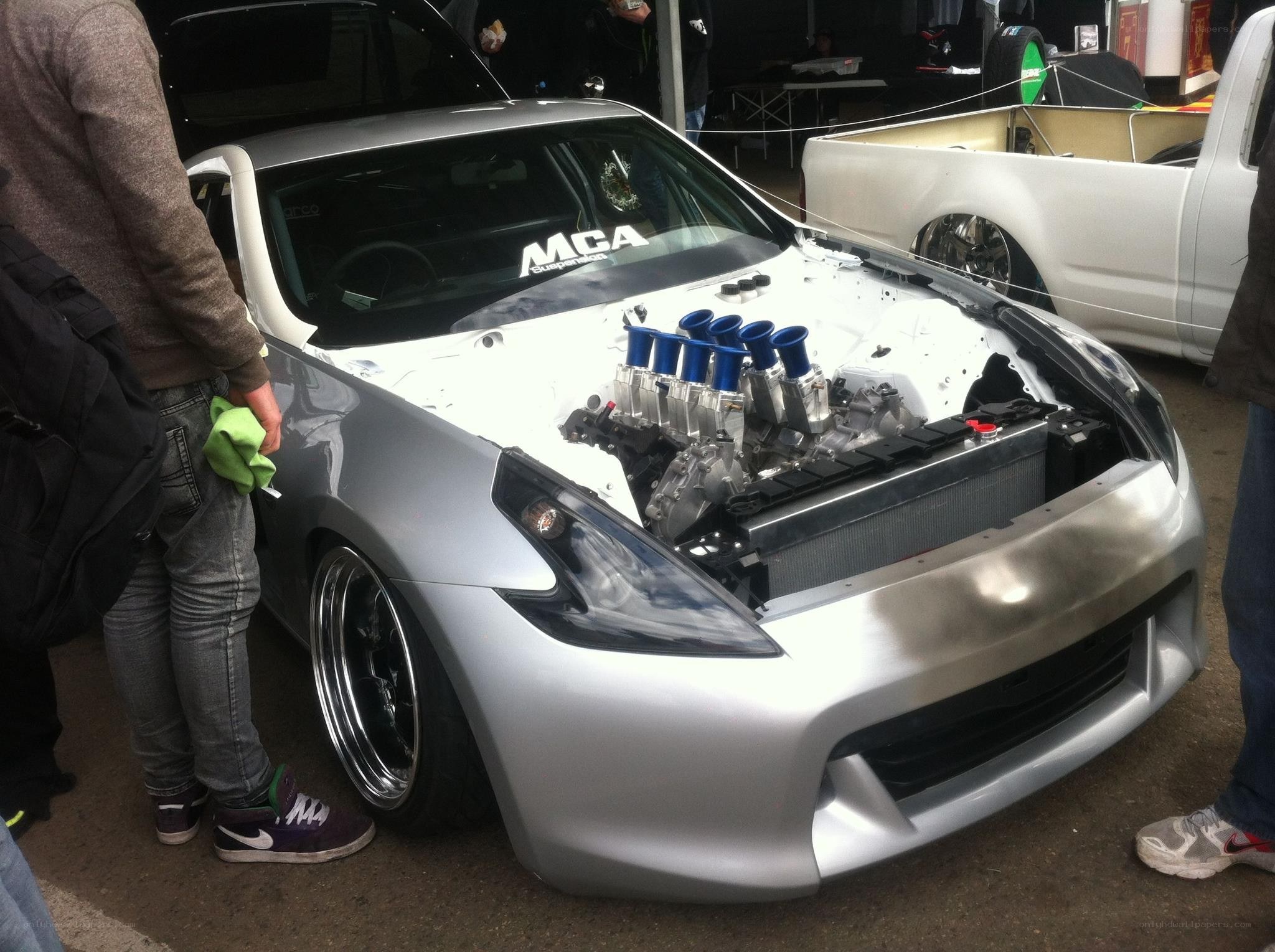 Custom silver sports car on display