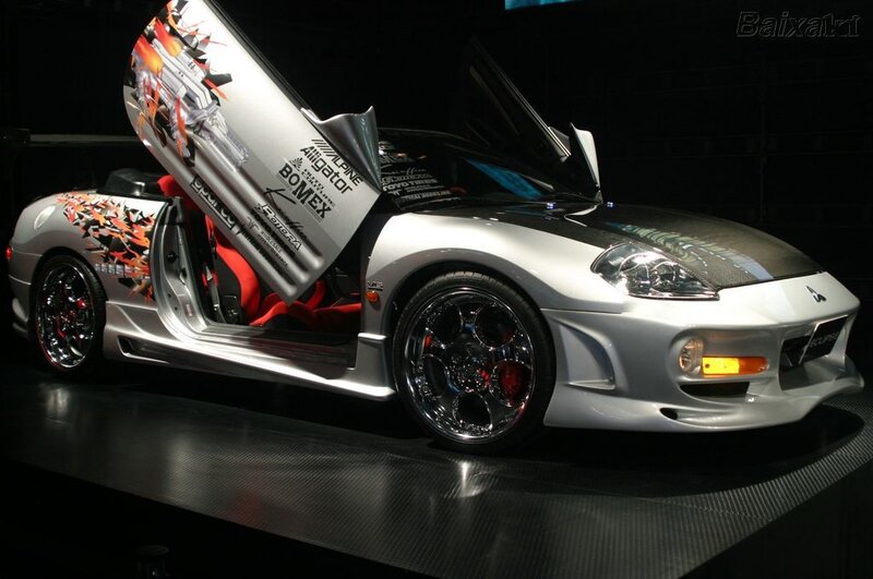Custom silver sports car with open doors