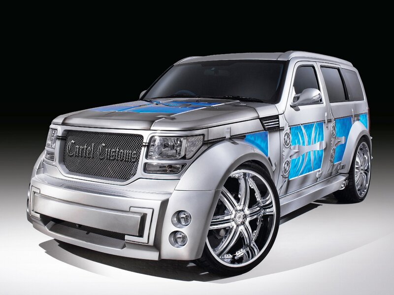 custom silver suv with blue graphics