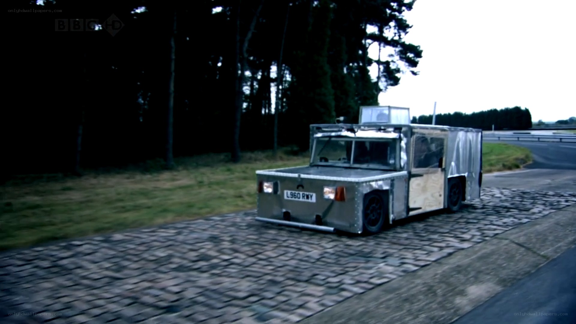 custom vehicle on cobblestones