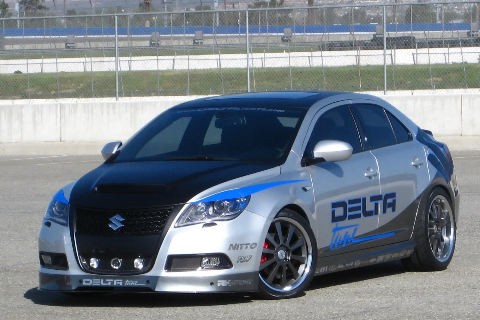customized silver and black sedan