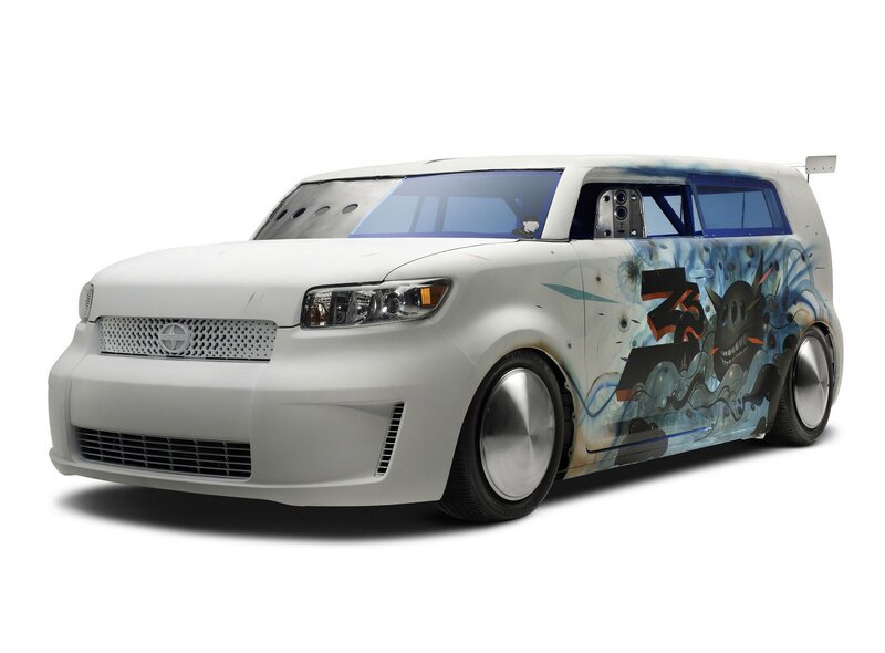 customized white scion xB with graffiti