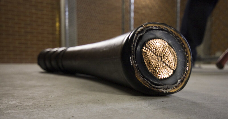 Cut electrical cable on floor