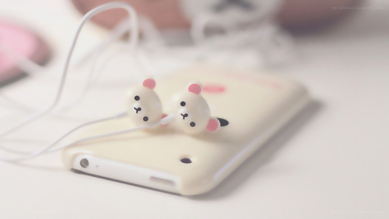 cute earbuds on phone