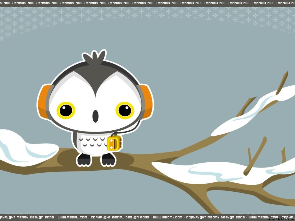 cute snowy owl on branch