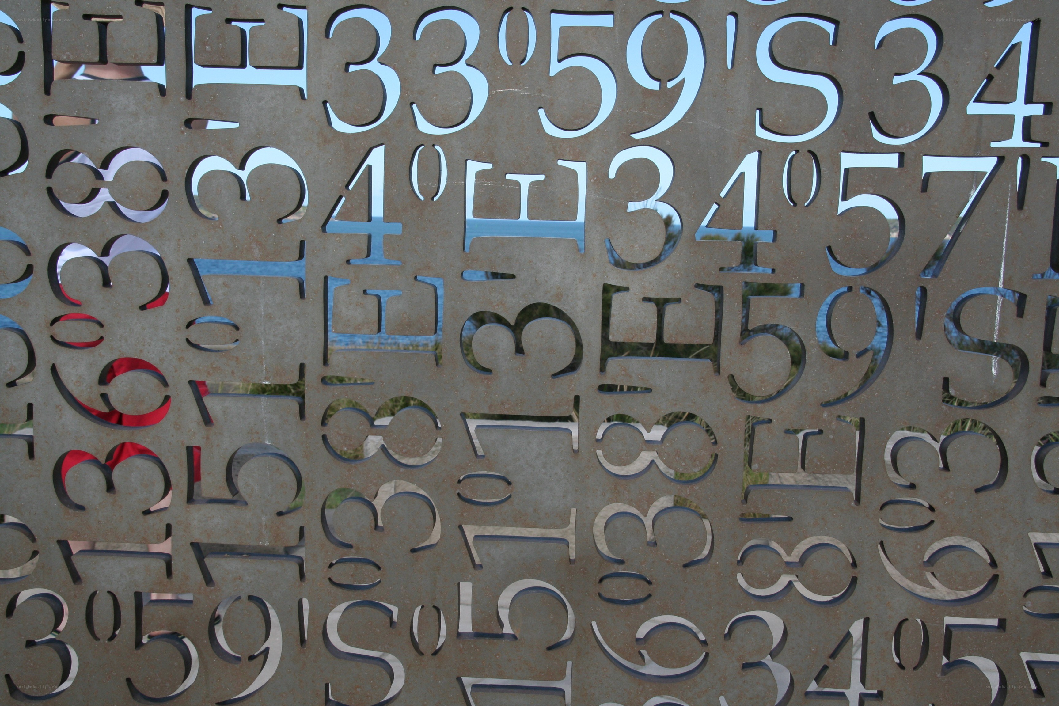 Cutout numbers and letters on metal