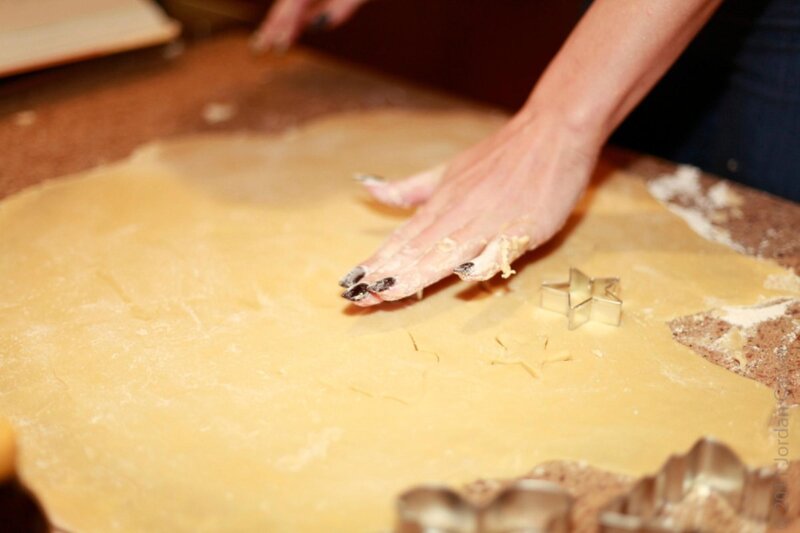 cutting dough with cookie cutter