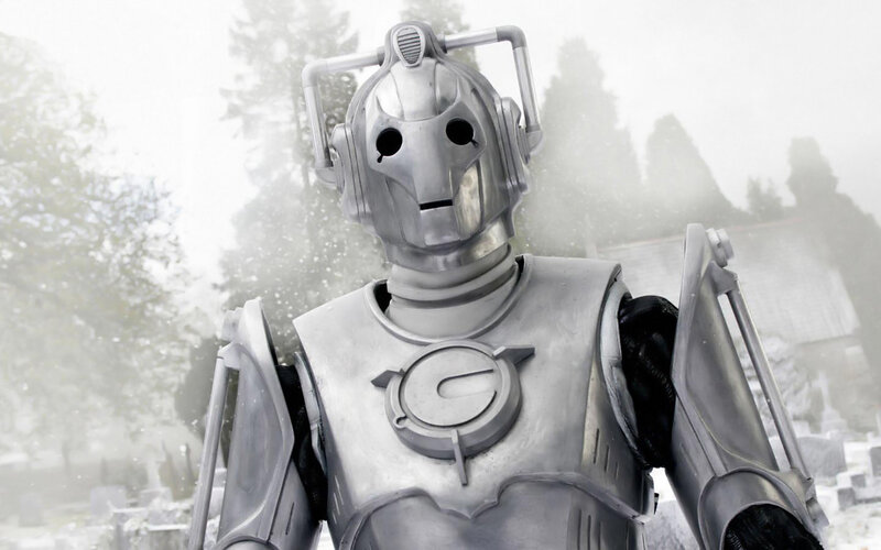 Cyberman in snowy graveyard