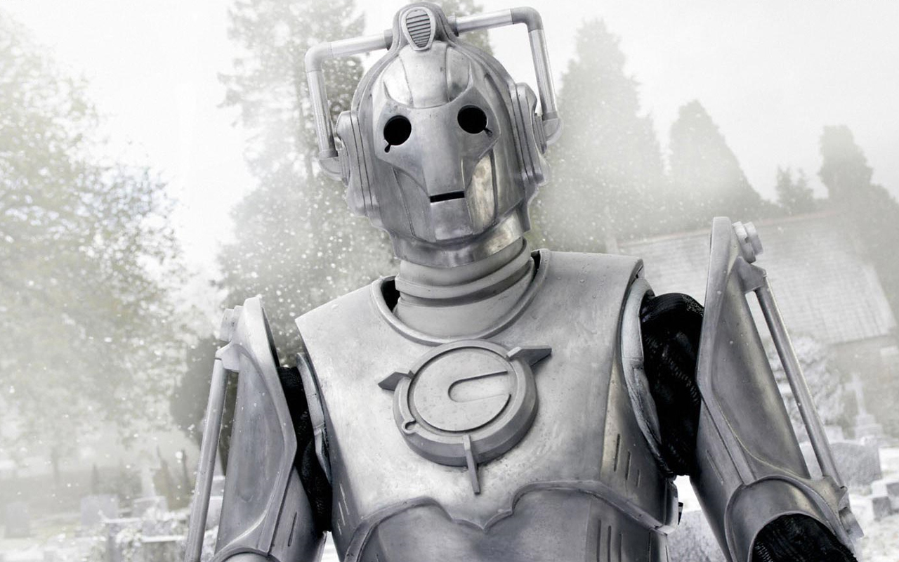 Cyberman in snowy graveyard