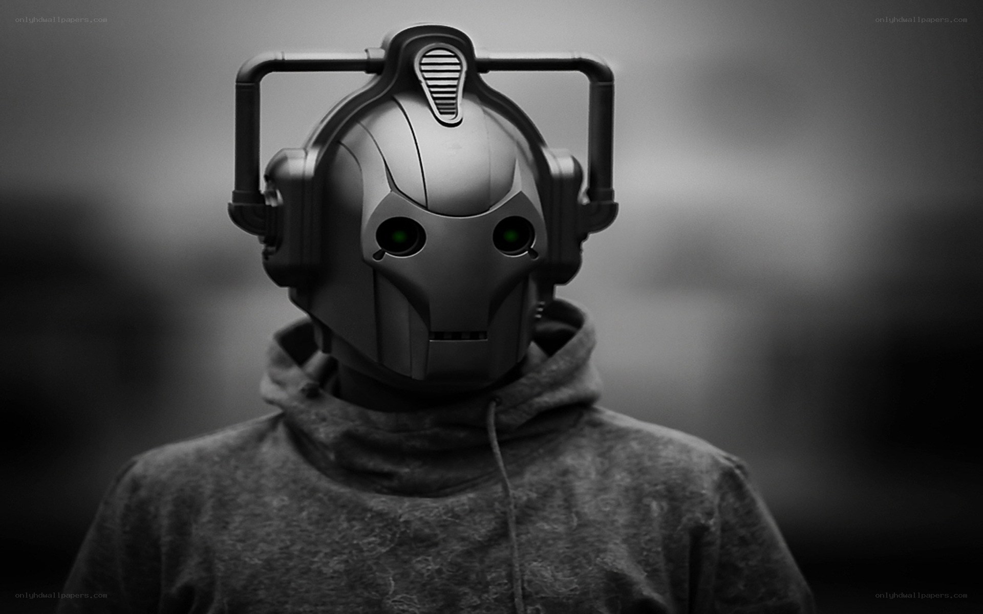 cybernetic figure in hoodie