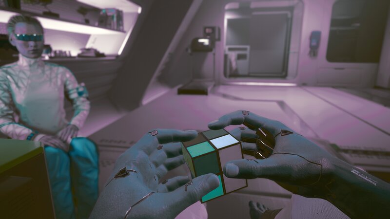 Cyborg Hands Holding Cube