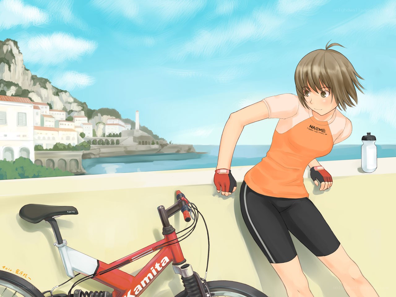 cyclist by the sea