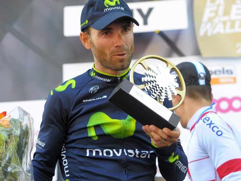 Cyclist Holding Trophy — Blue