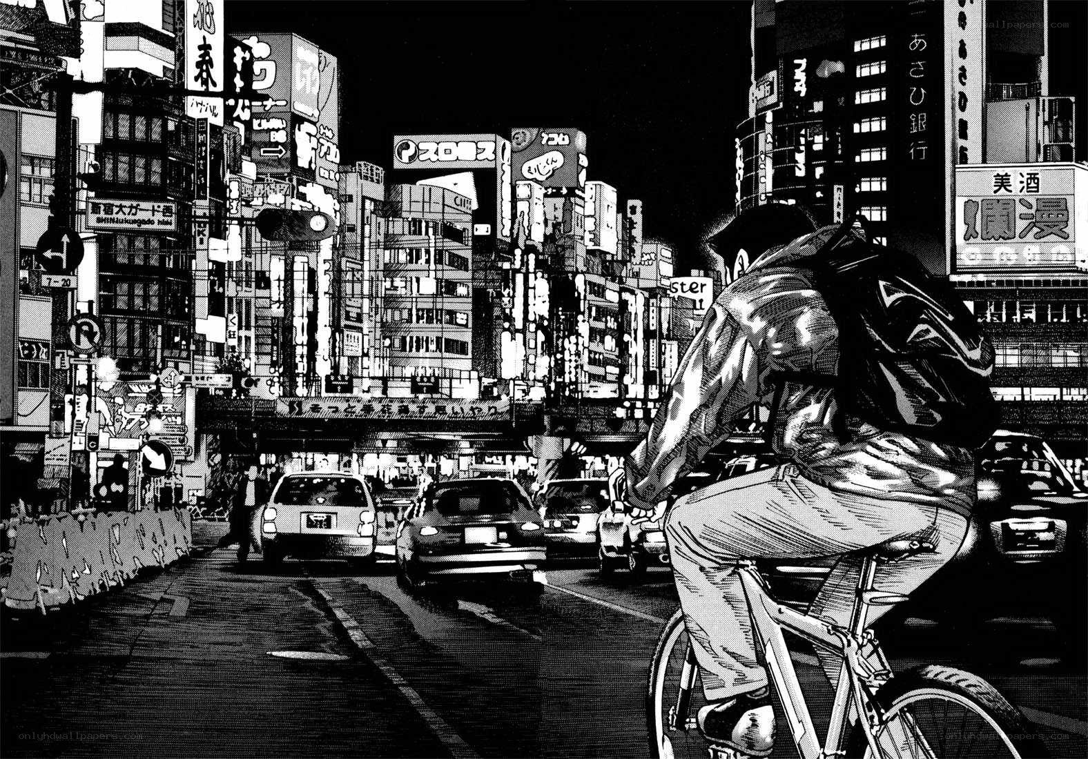 cyclist in a neon-lit city