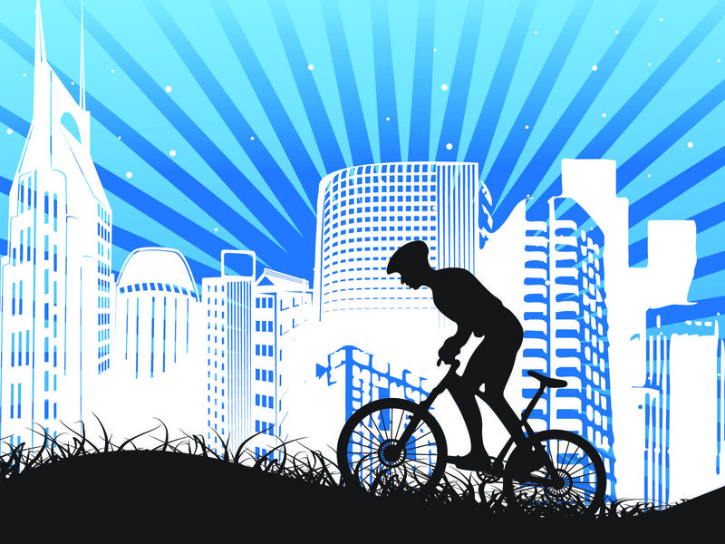 cyclist in city silhouette